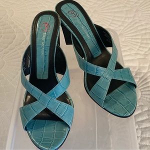 Turquoise Sandals 8.5. Like new only worn a few times. Heel height 3 1/2”